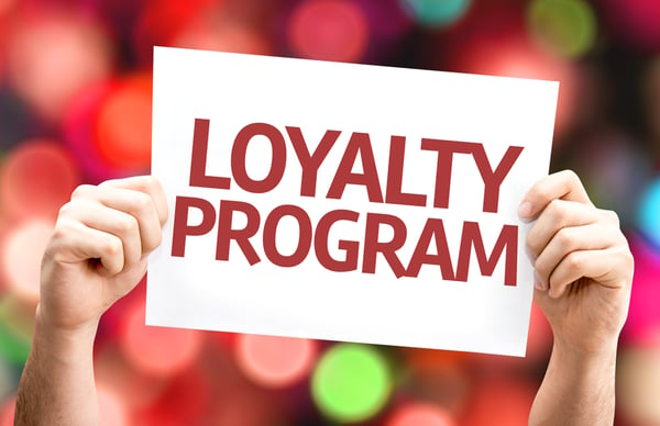 Loyalty Program card with colorful background with defocused lights