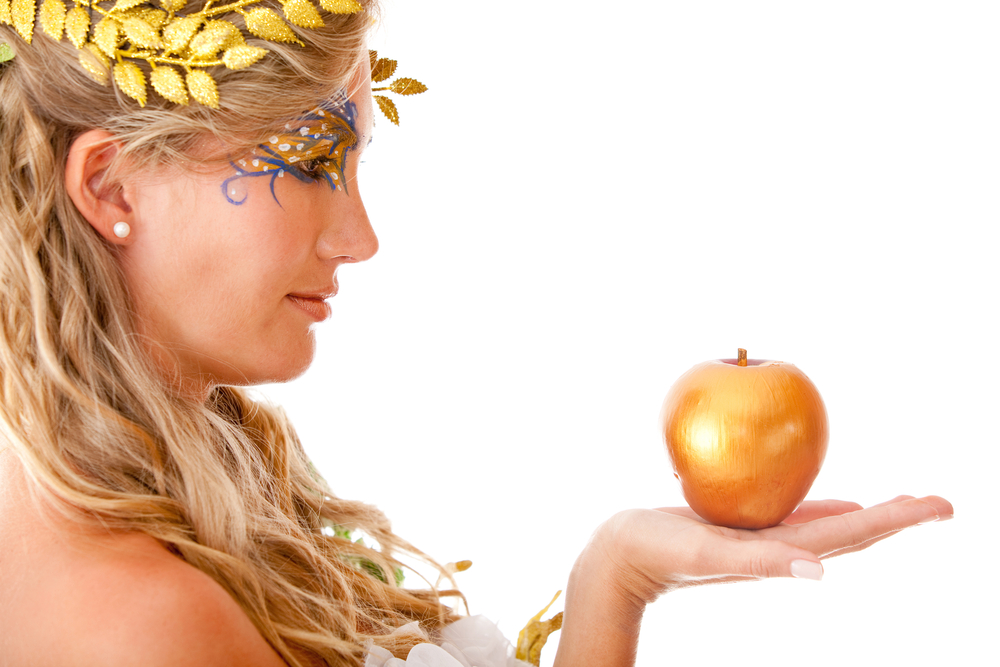 Portrait of a beautiful Greek goddess holding an apple- isolated over white-1