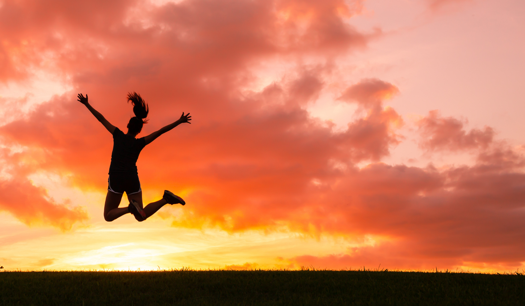 woman jumping in air 